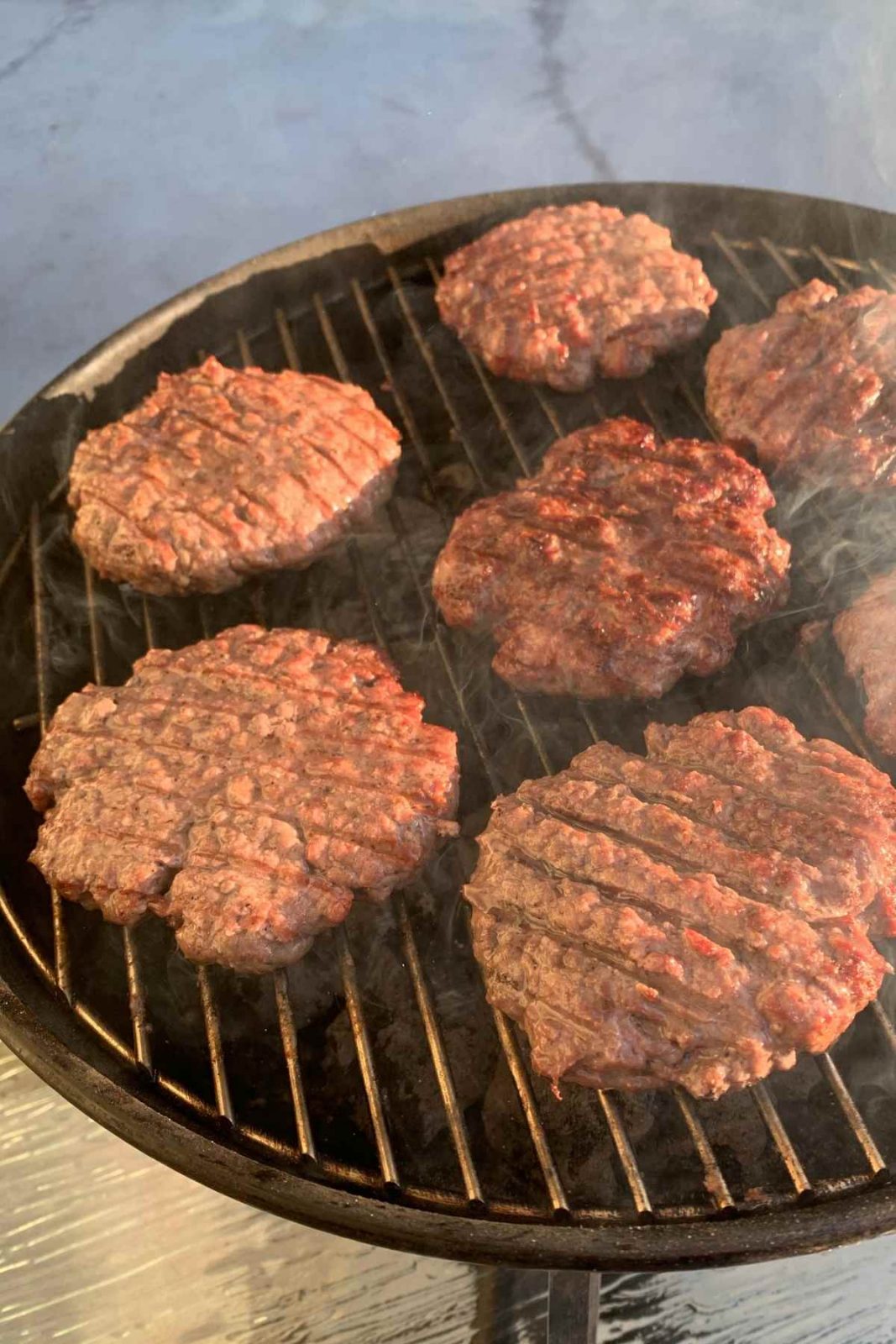 There’s no denying the amazing flavor of a homemade burger eaten right off the grill. It’s juicy, succulent, and just tastes better! If you’re new to grilling or looking to improve your grilling game, follow the burger grill time chart in this post. Say goodbye to dry, overcooked burgers and hello to perfectly juicy grilled burgers every time.