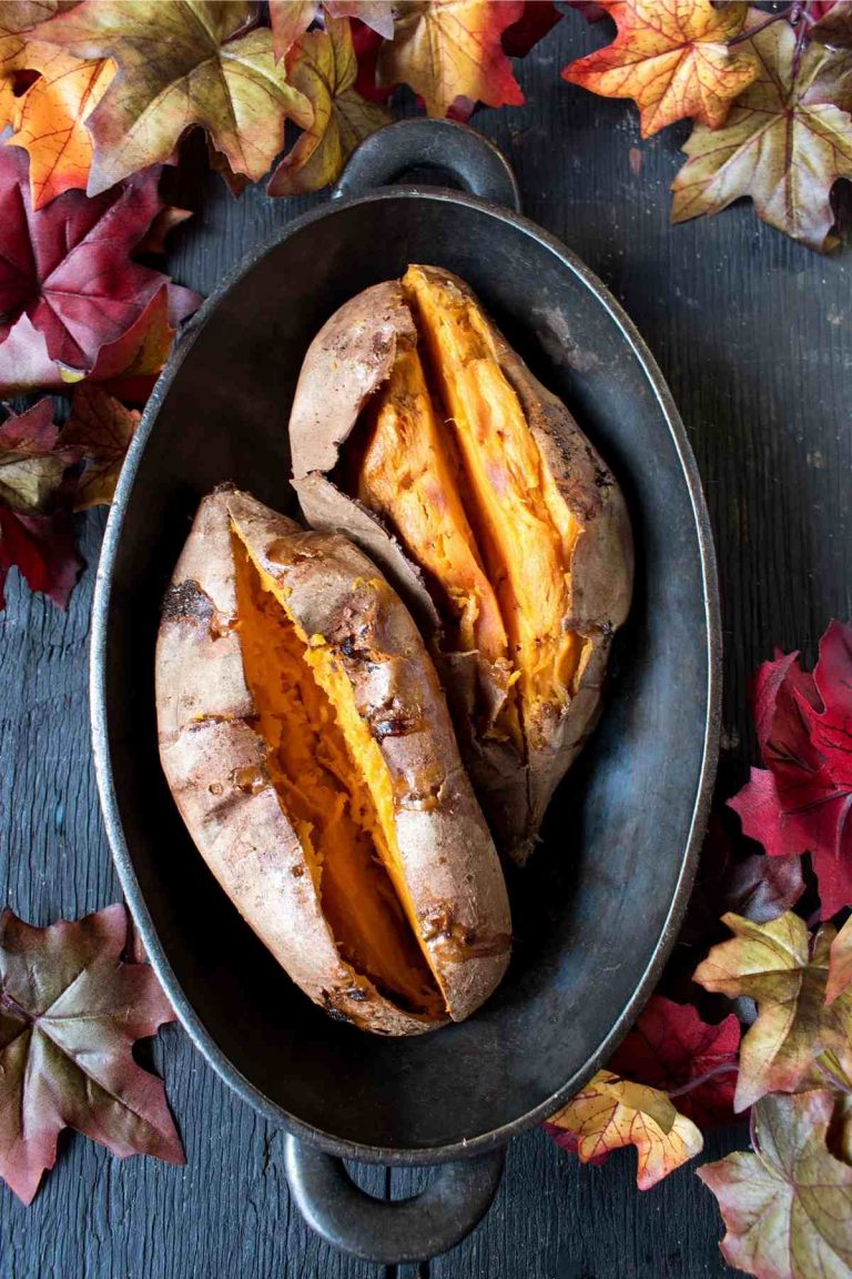 Learn how long to bake a sweet potato so it’s soft and fluffy on the inside with nice crispy skin! Here you’ll find tips for how to bake sweet potatoes at 350 and other oven temperatures. Enjoy the perfect baked sweet potato every time!
