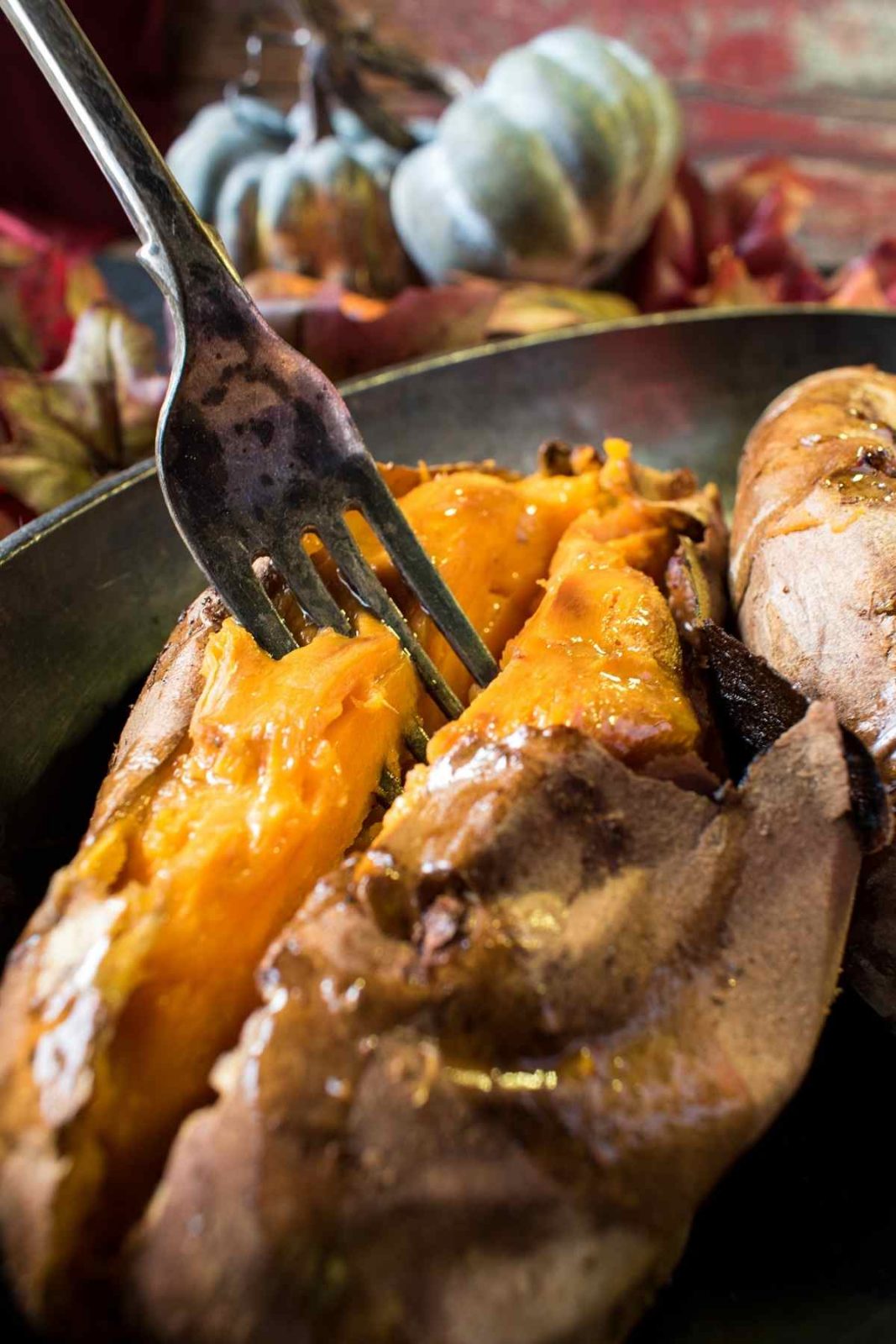 Learn how long to bake a sweet potato so it’s soft and fluffy on the inside with nice crispy skin! Here you’ll find tips for how to bake sweet potatoes at 350 and other oven temperatures. Enjoy the perfect baked sweet potato every time!