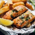 Perfectly baked salmon is tender, flaky, and moist. You can easily achieve a delicious piece of salmon in your oven! If you bake your salmon in foil at 350 F degrees, the trick is knowing exactly how long to bake salmon to achieve the juicy results every time.
