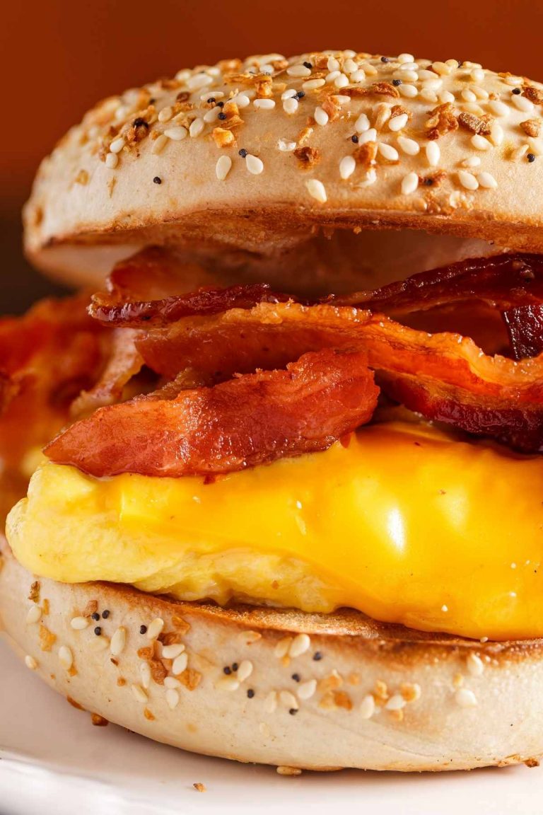 If you are looking for a breakfast that’s truly satisfying and convenient, you can’t go wrong with a bacon, egg and cheese Bagel Breakfast Sandwich! Just imagine starting your day with crispy bacon, melted cheese and a classic omelet in between a lightly toasted bagel.