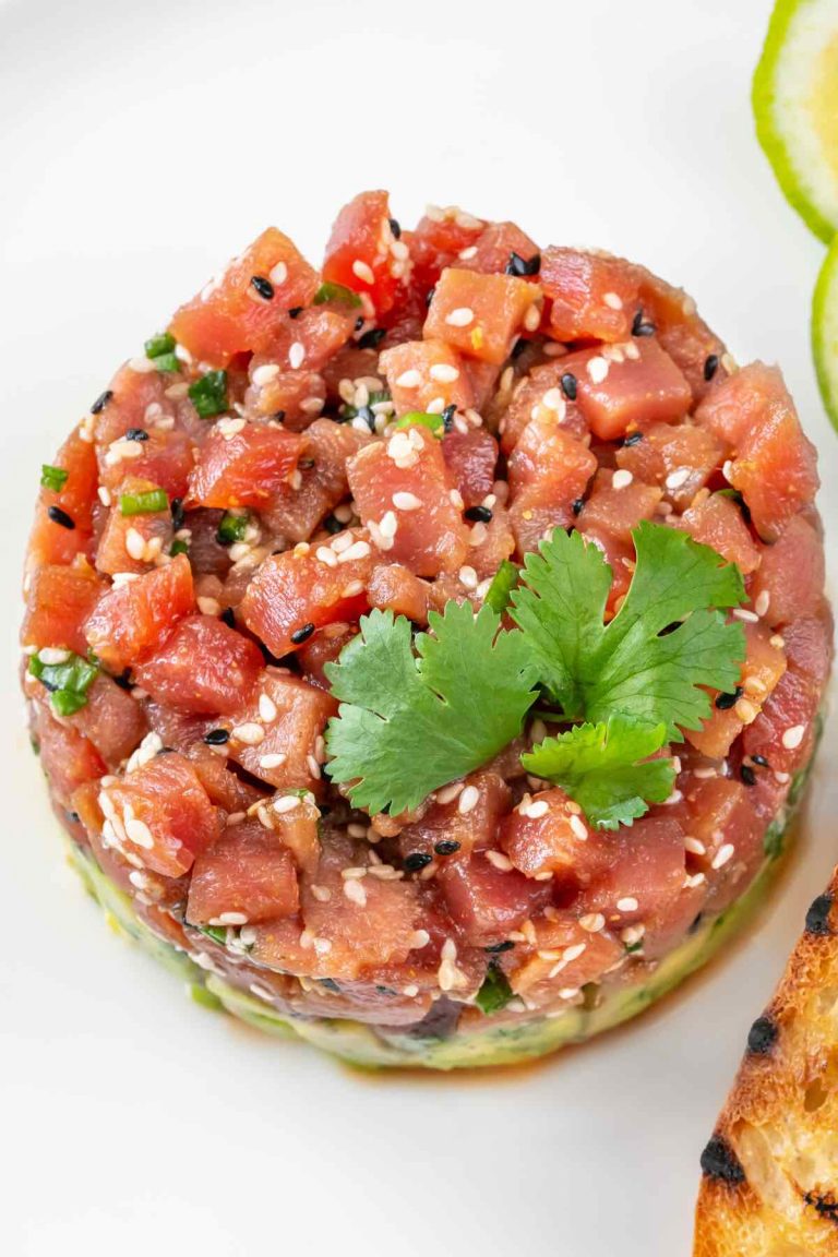 Tuna Tartar is loaded with delicious cubes of raw, sashimi-grade tuna that has been lightly seasoned. The tuna is placed atop creamy avocado for a flavor combo that’s out of this world.