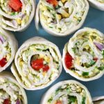 Picnic Food Avocado Chicken Rolls are creamy and delicious, made with grilled or leftover chicken, avocado, bell pepper and cheese. This chicken roll idea also makes a fabulous party appetizer. Ready in just 20 minutes!