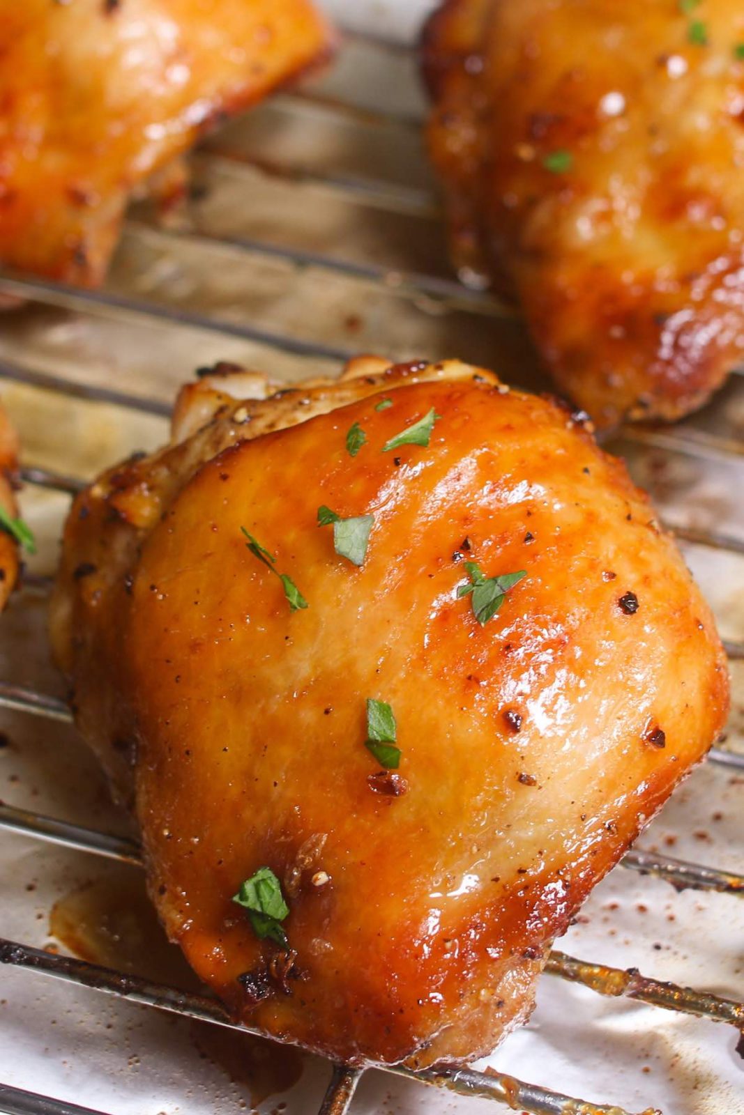 These Weeknight Dinner Baked Chicken Thighs are crispy on the outside with tender dark meat on the inside. With a few tips and some simple ingredients, you can easily make delicious chicken thighs for a simple one pan dinner!