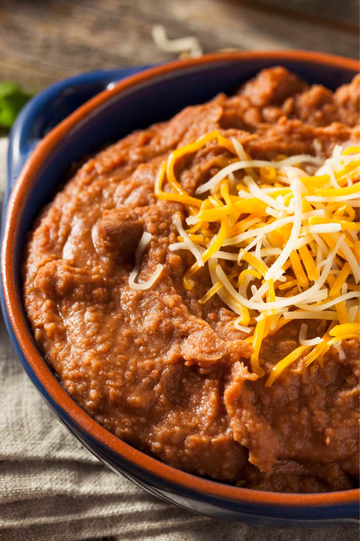 Canned refried beans are a convenient and versatile pantry staple, but let's be honest, they often lack the flavor and texture of the ones you find at your favorite Mexican restaurant. However, with a few simple additions and techniques, you can easily transform canned refried beans into a delicious and satisfying dish. In this post, you’ll learn a few easy ways to make your canned refried beans taste better with fantastic texture, and overall experience.